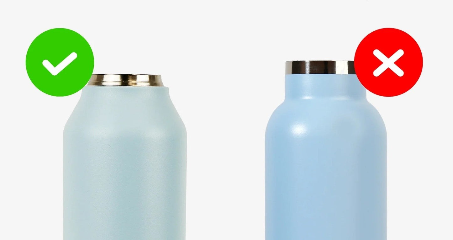 Bouchon avec tétine et poignée rabattable